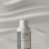 Body Oil – Reducerer strækmærker, ar og pigmentpletter — Body Oil reducerer strækmærker, ar og pigmentpletter. Med mandelolie, squalane og vitamin E efterlades huden blød, smidig og velplejet.